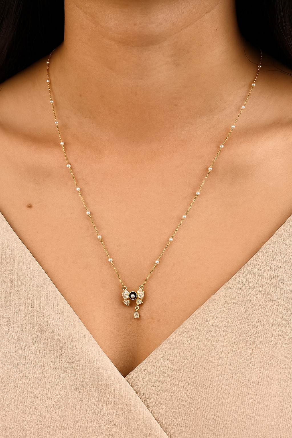 Diamond Bow Necklace with Black Pearl