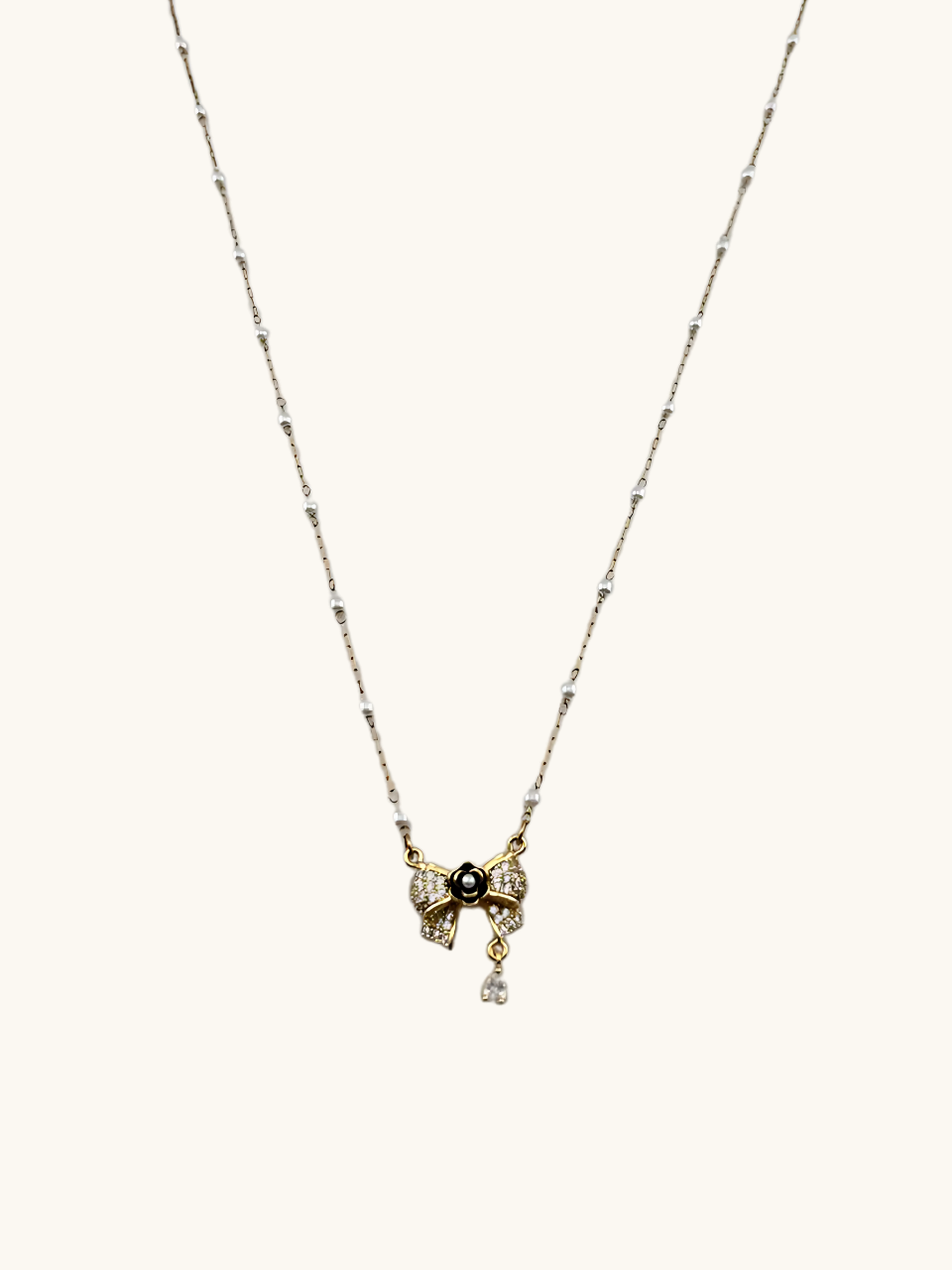 Diamond Bow Necklace with Black Pearl