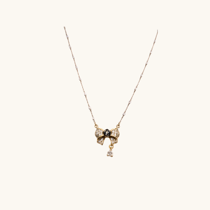Diamond Bow Necklace with Black Pearl