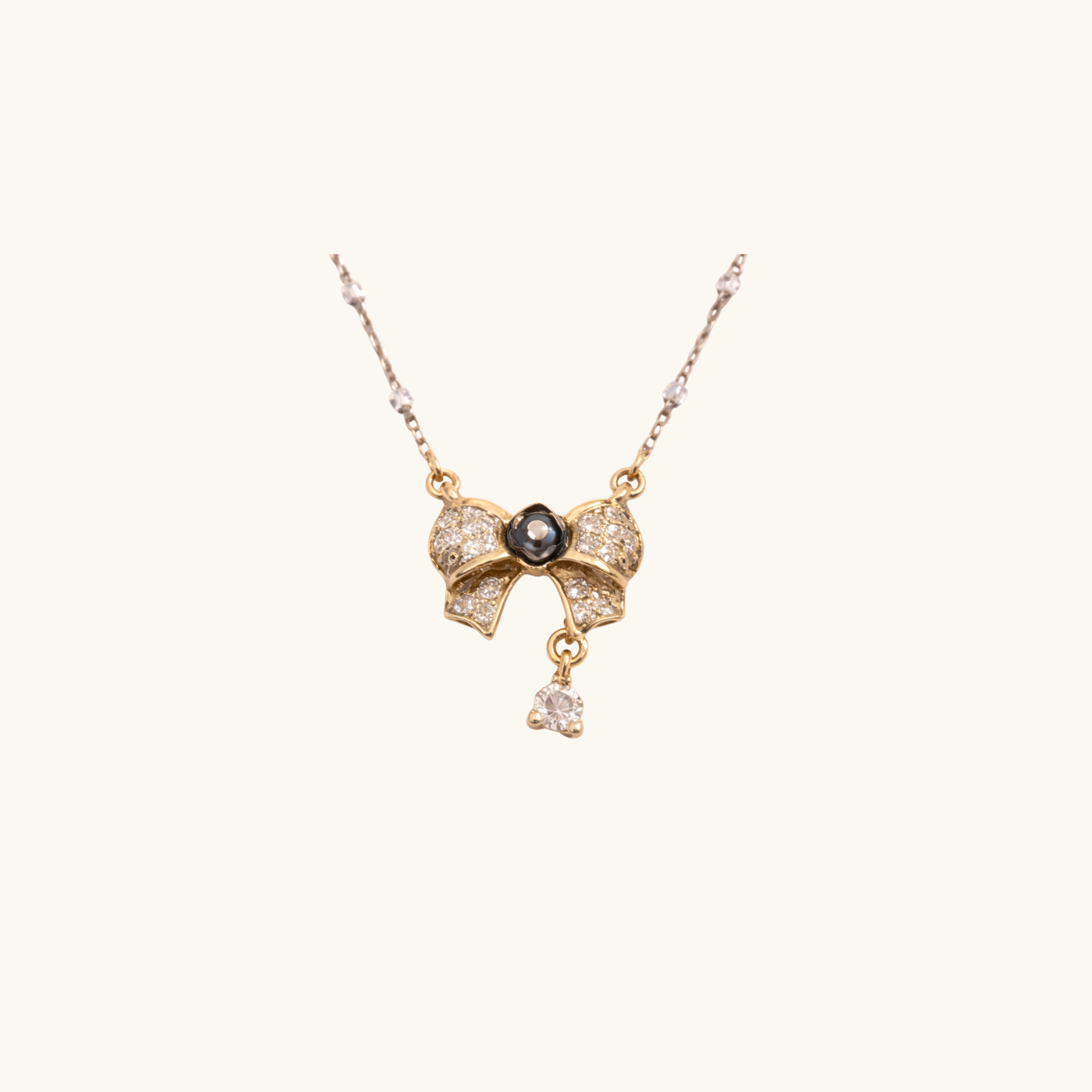 Diamond Bow Necklace with Black Pearl