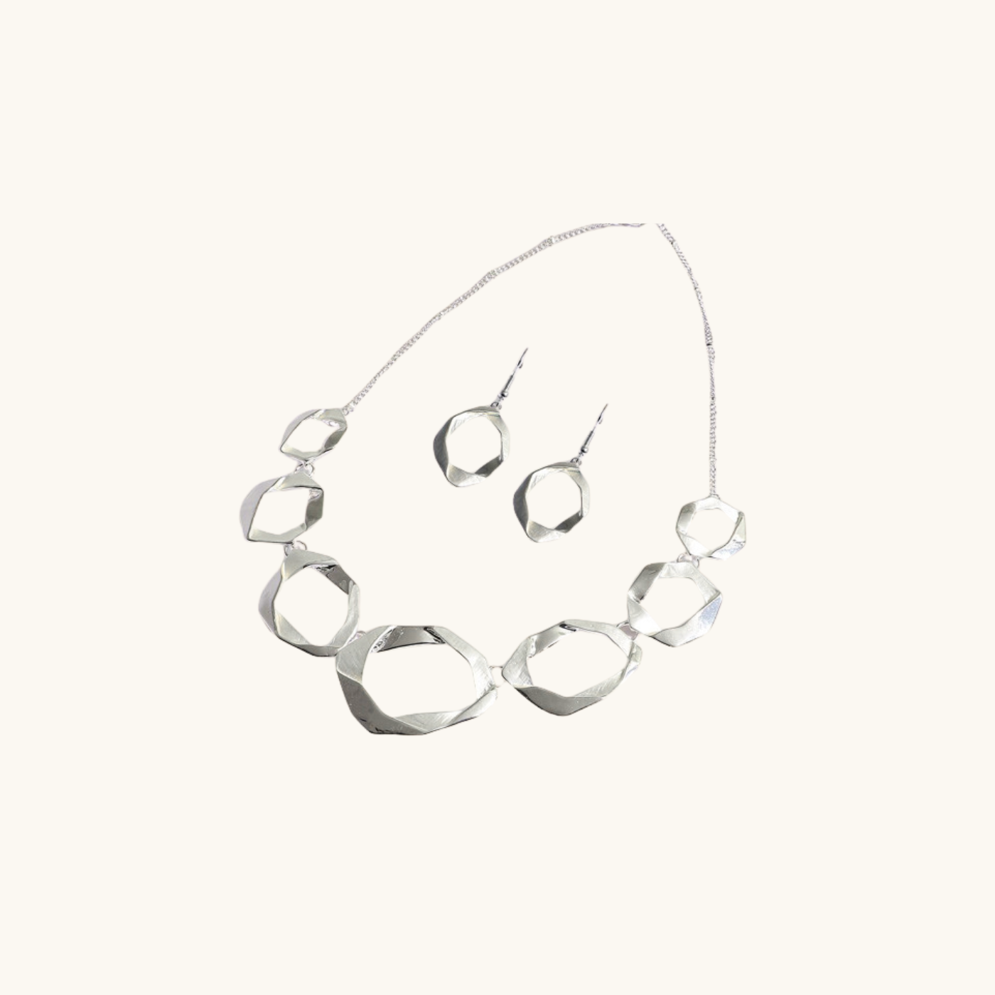 Silver Toned Twisted Necklace With Earrings