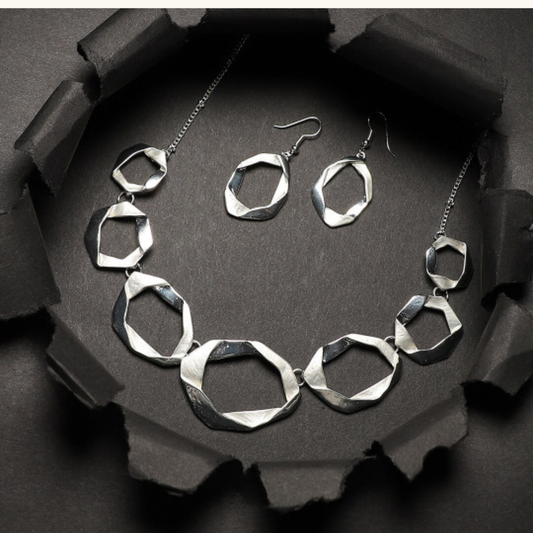 Silver Toned Twisted Necklace With Earrings