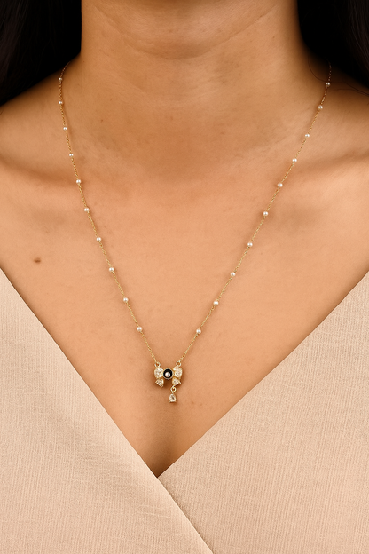 Diamond Bow Necklace with Black Pearl