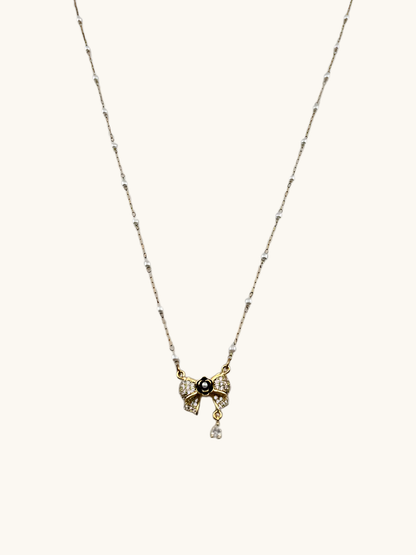 Diamond Bow Necklace with Black Pearl