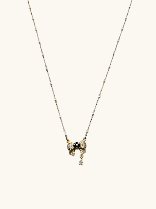 Diamond Bow Necklace with Black Pearl