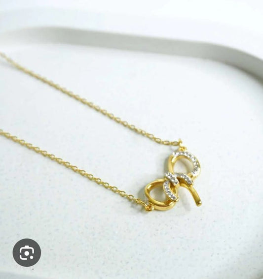 Radiant Ribbon Charm